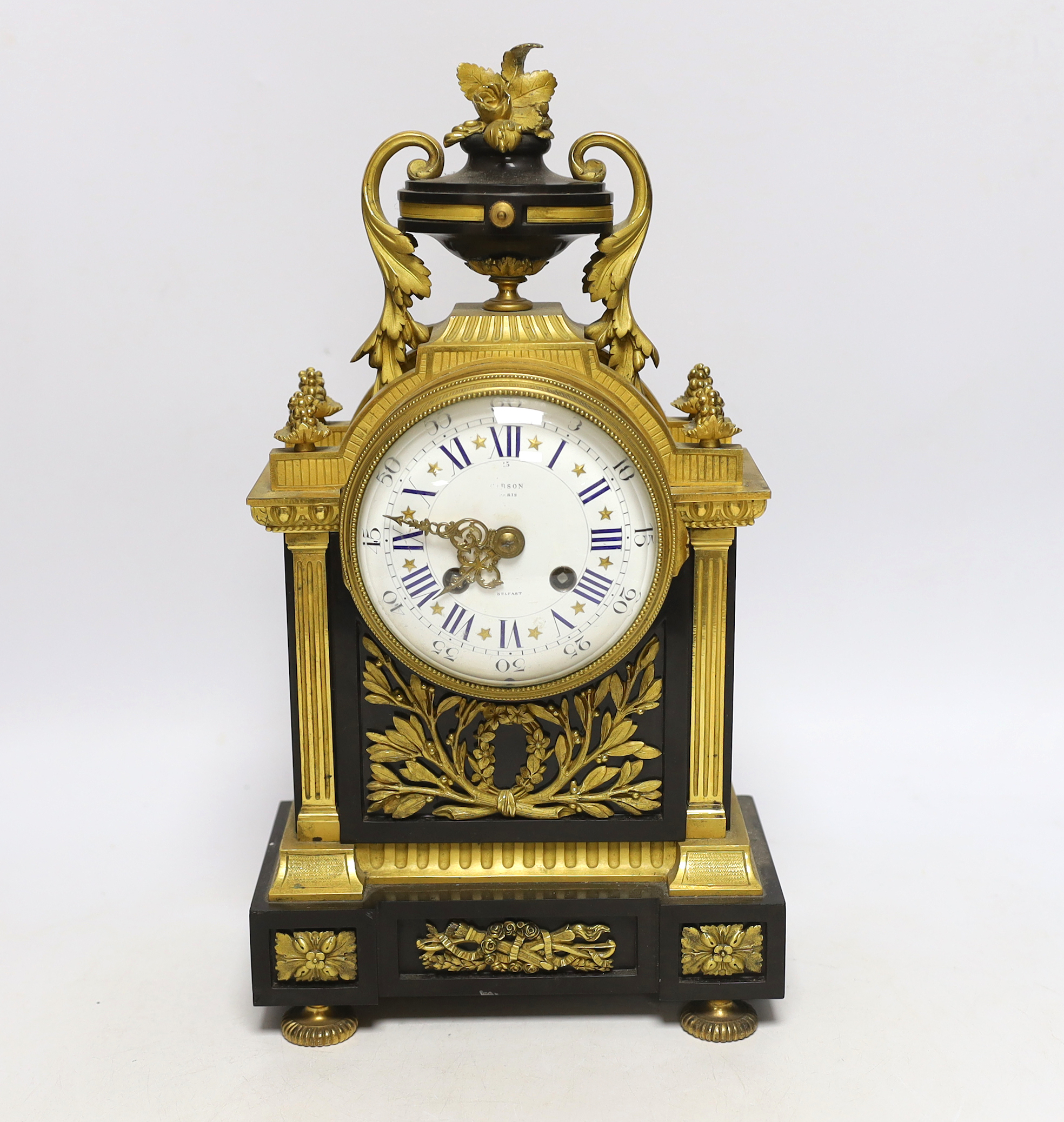 A Louis XVI style bronze and ormolu mantel clock, the enamel dial inscribed Gibson, Paris, 37cm high